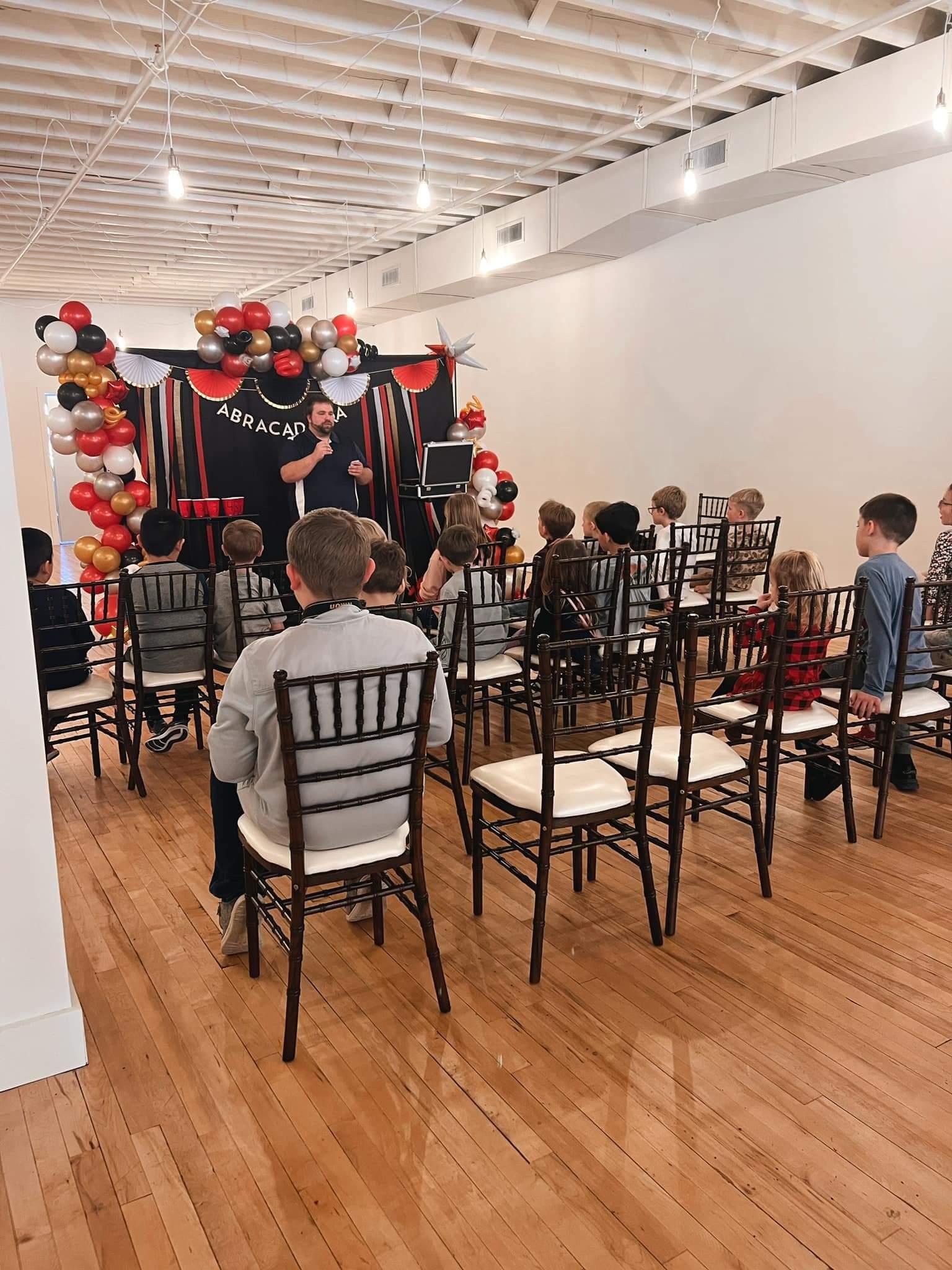 Audience seating before a Nate Heater Magic private show